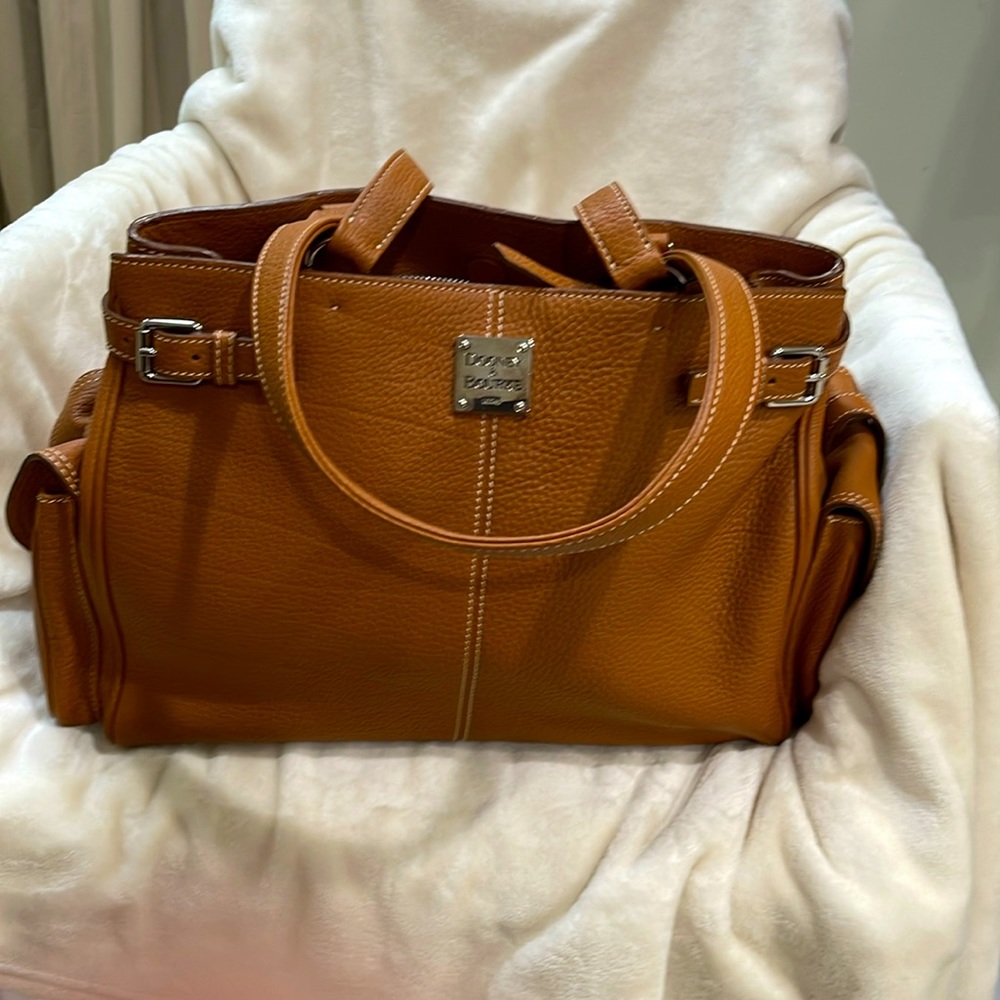Dooney & Burke (1975) large compartment bag  bag can be use as a diaper bag too